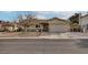 Single-story home with attached two-car garage and landscaped front yard at 750 Willow Ave, Henderson, NV 89002