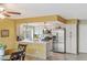 Cozy kitchen with stainless steel appliances, white cabinets, and light countertops at 750 Willow Ave, Henderson, NV 89002