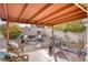 Cozy patio with comfortable seating and a fire pit feature at 750 Willow Ave, Henderson, NV 89002