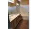 Bathroom with double vanity and bathtub at 8708 Gateway Glen Dr, Las Vegas, NV 89178