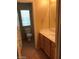 Clean bathroom with light wood vanity and tiled floor at 8708 Gateway Glen Dr, Las Vegas, NV 89178