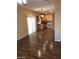 Open kitchen with light wood cabinets and laminate flooring at 8708 Gateway Glen Dr, Las Vegas, NV 89178