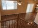 Upstairs view of living room with laminate flooring at 8708 Gateway Glen Dr, Las Vegas, NV 89178