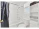 Bathroom with tub, shower, and storage at 9321 Straw Hays St # 101, Las Vegas, NV 89178