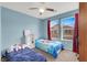 Spacious bedroom with two twin beds, ample closet space and natural light at 9321 Straw Hays St # 101, Las Vegas, NV 89178