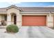 Single-story home with attached garage and landscaped front yard at 1017 Chestnut Bay Ave, North Las Vegas, NV 89031