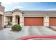 Single-story home with attached garage and landscaped front yard at 1017 Chestnut Bay Ave, North Las Vegas, NV 89031