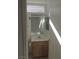 Simple bathroom with wood vanity and sink at 10321 Junction Hill Dr, Las Vegas, NV 89134