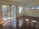 Bright living area with hardwood floors and access to backyard at 10321 Junction Hill Dr, Las Vegas, NV 89134