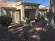 Back patio with covered seating area at 10321 Junction Hill Dr, Las Vegas, NV 89134