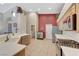 Spacious kitchen featuring ample counter space, stainless appliances, and adjacent laundry area at 1595 Cattle Ranch Pl, Henderson, NV 89002