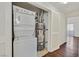 Laundry area with washer, dryer, and storage within a closet space at 1900 N Torrey Pines Dr # 112, Las Vegas, NV 89108