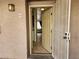 Condo entryway with security door and interior view at 2060 Mesquite Ln # 104, Laughlin, NV 89029