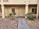 Condo building exterior showing walkway and entrance at 2060 Mesquite Ln # 104, Laughlin, NV 89029