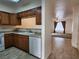 Condo kitchen with wood cabinets and appliances at 2060 Mesquite Ln # 104, Laughlin, NV 89029