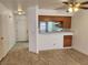Condo living room with tile floor and kitchen view at 2060 Mesquite Ln # 104, Laughlin, NV 89029
