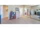 Home hallway with mirrored closet and access to bathroom at 2061 Iroquois Ave, Pahrump, NV 89048