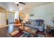 Living room with comfy seating and a view into the dining area at 2061 Iroquois Ave, Pahrump, NV 89048