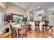 Bright dining area with a round table and four chairs at 209 Long Shadow Ter, Henderson, NV 89015