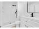 Stylish bathroom with white vanity, walk-in shower, and modern fixtures at 2116 Fuller Rd, Las Vegas, NV 89108