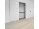 Spacious bedroom closet with sliding doors and ample shelving at 2116 Fuller Rd, Las Vegas, NV 89108