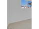 Bright bedroom with neutral carpeting and view of backyard pool at 2116 Fuller Rd, Las Vegas, NV 89108