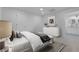 Bright bedroom with plush bedding and a spacious walk-in closet at 2116 Fuller Rd, Las Vegas, NV 89108