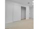 Spacious bedroom with a large closet and neutral carpeting at 2116 Fuller Rd, Las Vegas, NV 89108