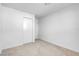 Simple bedroom with double door closet and neutral carpeting at 2116 Fuller Rd, Las Vegas, NV 89108
