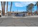 Single story home with landscaped yard and driveway at 2116 Fuller Rd, Las Vegas, NV 89108
