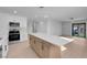 Modern kitchen with stainless steel appliances and large island at 2116 Fuller Rd, Las Vegas, NV 89108