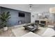 Living room with gray brick fireplace and modern decor at 2116 Fuller Rd, Las Vegas, NV 89108