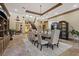 Spacious dining room with large table and built-in shelving at 22 Rue Grimaldi Way, Henderson, NV 89011