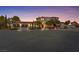 Stately two-story home featuring a tile roof, manicured landscaping, and a spacious three-car garage at 22 Rue Grimaldi Way, Henderson, NV 89011