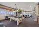 Game room with pool table, seating area, and large windows offering scenic views at 22 Rue Grimaldi Way, Henderson, NV 89011