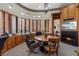 Spacious home office offers custom built-ins, a fireplace, and a curved seating area at 22 Rue Grimaldi Way, Henderson, NV 89011