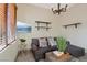 Comfortable living room with a plush sofa, decorative pillows, and modern decor at 22 Rue Grimaldi Way, Henderson, NV 89011