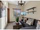 Inviting living room featuring a comfortable sofa, stylish decor, and recessed lighting at 22 Rue Grimaldi Way, Henderson, NV 89011