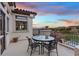 Private rooftop patio with seating area and stunning sunset views at 22 Rue Grimaldi Way, Henderson, NV 89011