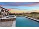 Stunning pool and spa with golf course views at sunset at 22 Rue Grimaldi Way, Henderson, NV 89011