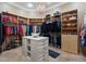 Large Primary closet with custom built-ins and island at 22 Rue Grimaldi Way, Henderson, NV 89011