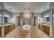 Spacious bathroom featuring a luxurious soaking tub and and vanities at 2871 S Woodchips Rd, Pahrump, NV 89048