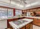 Kitchen with island, double sinks, and views to the pool at 3128 University Ave, Las Vegas, NV 89121