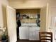 Laundry closet with washer, dryer, and shelving at 3550 Bay Sands Dr # 1017, Laughlin, NV 89029