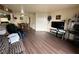Open living area with laminate floors and access to patio at 3550 Bay Sands Dr # 1017, Laughlin, NV 89029