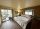 Main bedroom with king bed and access to a patio/balcony at 3550 Bay Sands Dr # 1017, Laughlin, NV 89029
