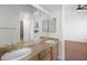 Well-lit bathroom with double sinks and granite countertop at 3757 Brittany Nicole Ct, Las Vegas, NV 89139