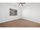 Bright bedroom with ceiling fan and window at 3757 Brittany Nicole Ct, Las Vegas, NV 89139