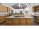Modern kitchen with large island and stainless steel appliances at 3757 Brittany Nicole Ct, Las Vegas, NV 89139