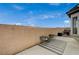 Small backyard with patio and two chairs at 376 Hanbury Manor Ln, Las Vegas, NV 89145